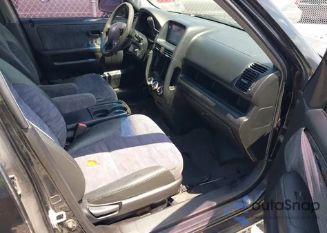 2002 Honda Cr-V z USA, uszkodzony, nr VIN JHLRV68452C015670